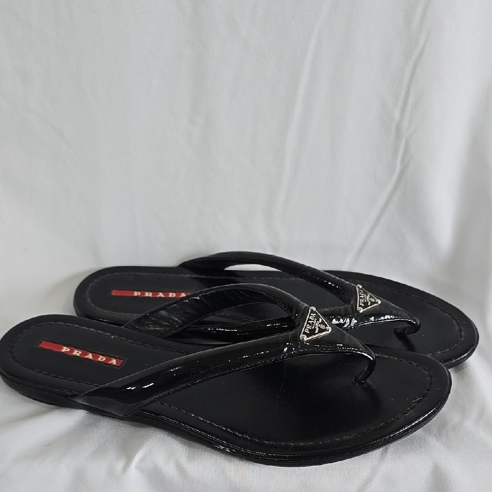 Prada Black Sandals with Glossy Strap and Silver Embellishment